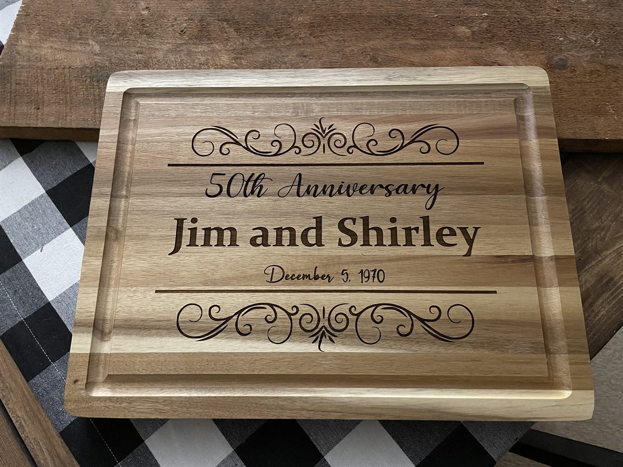 Wooden cutting board engraved 50th Anniversary, Jim and Shirley, December 5 1970