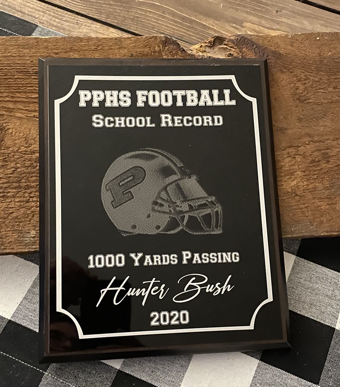 Black PPHS Football school record plaque with engraved helmet, 1000 yards passing, Hunter Bush 2020