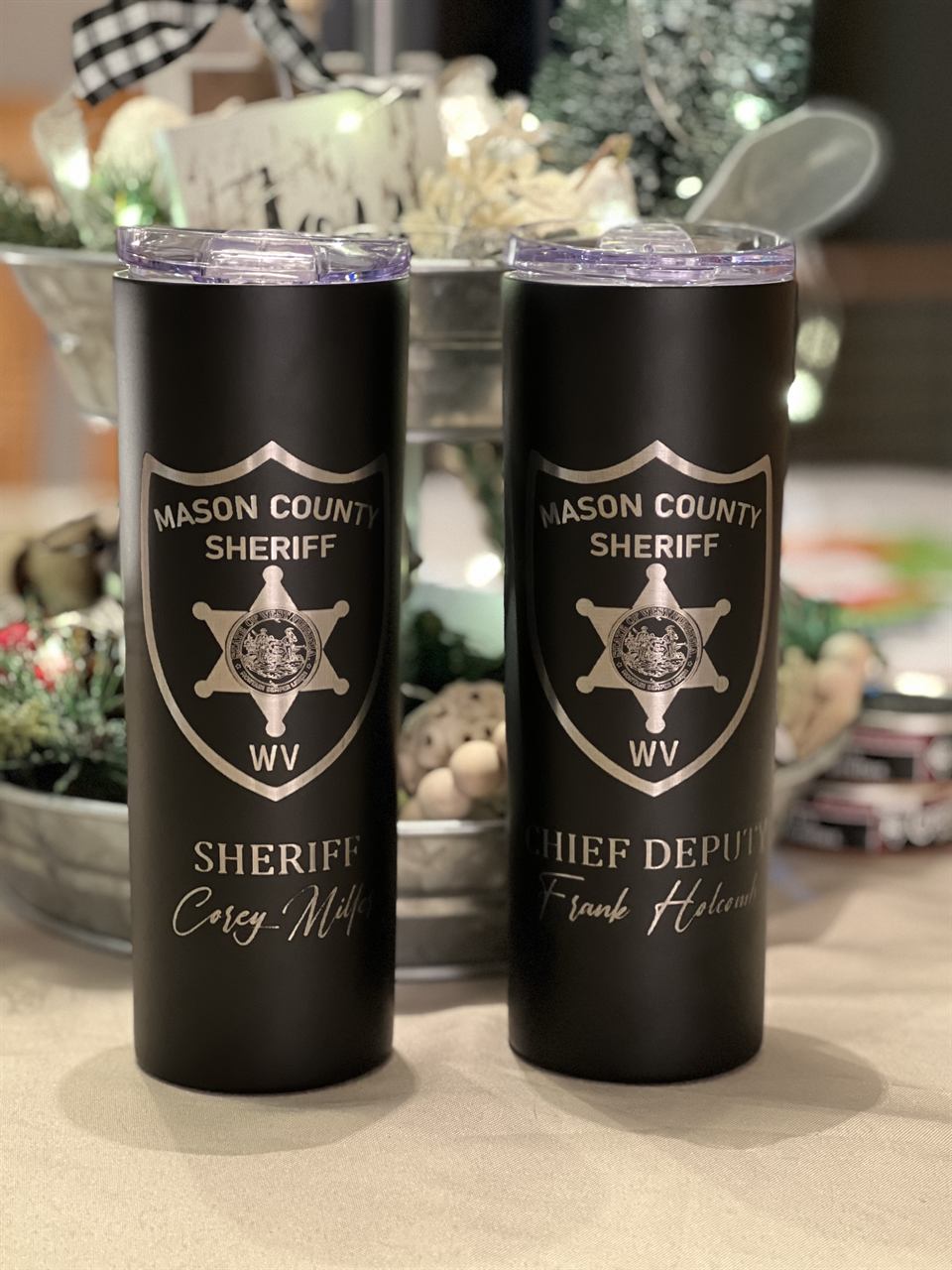 Black tumblers laser engraved with the Mason County WV Sheriff badge, name and title